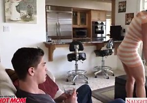 Tanned brunette mommy fucked with legs spread